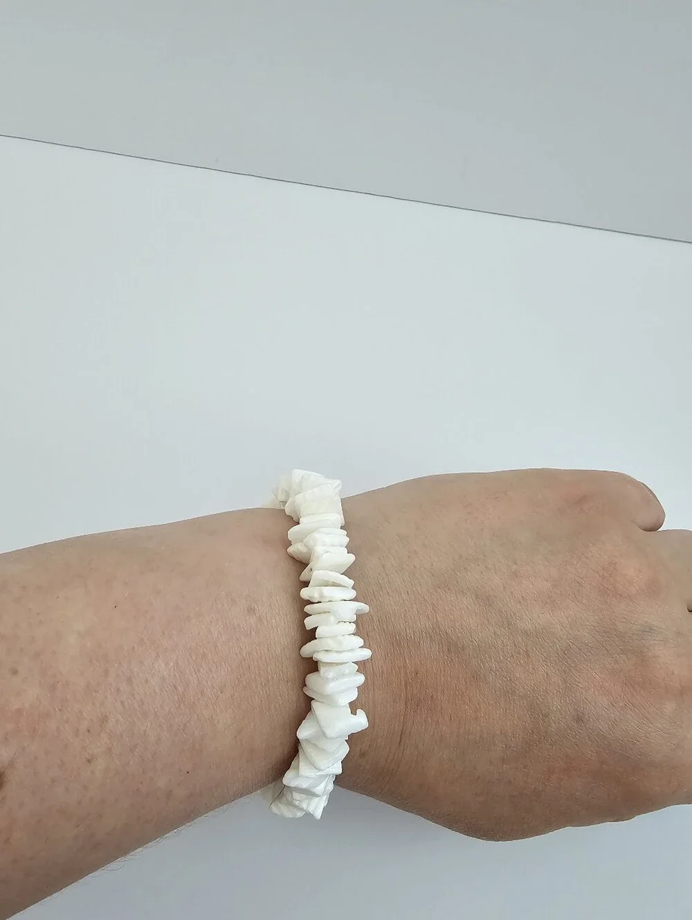 Vintage white puka